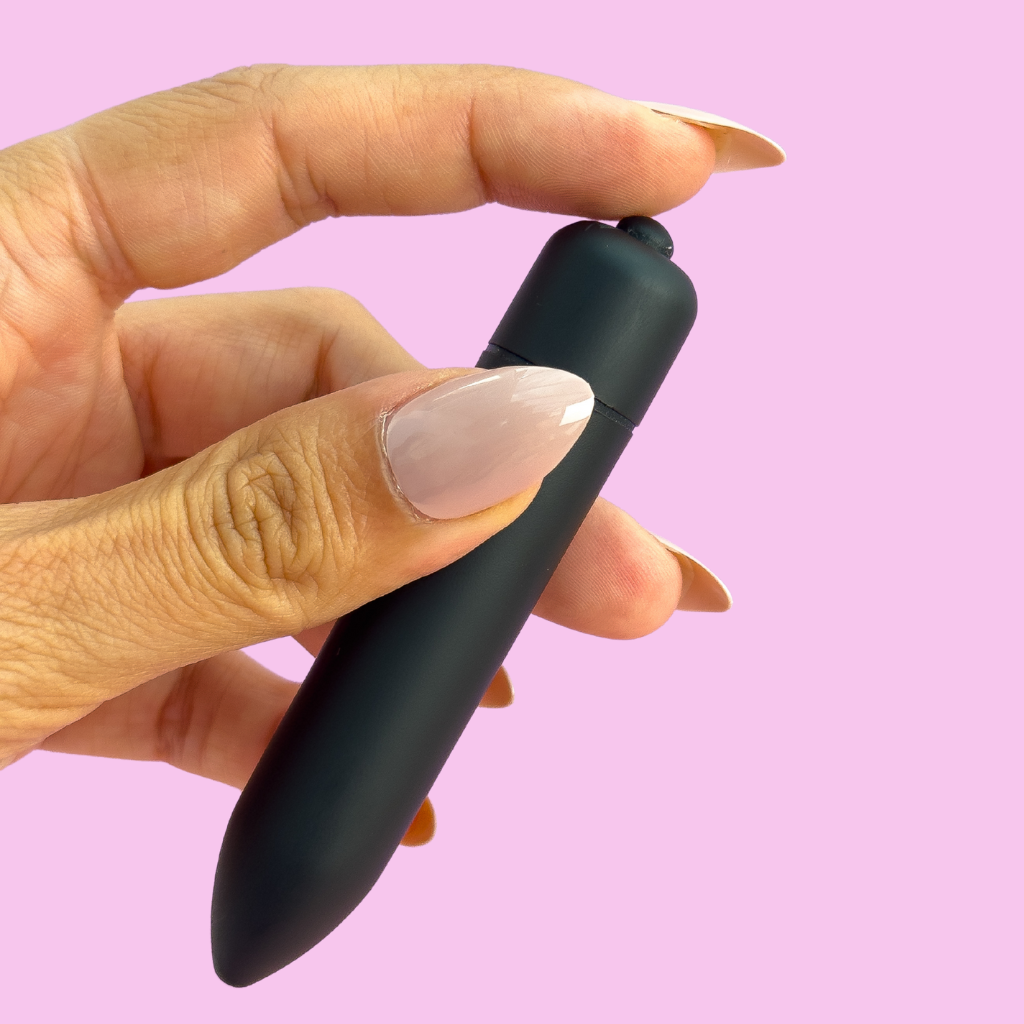 Small black bullet vibrator for external stimulation, battery operated.