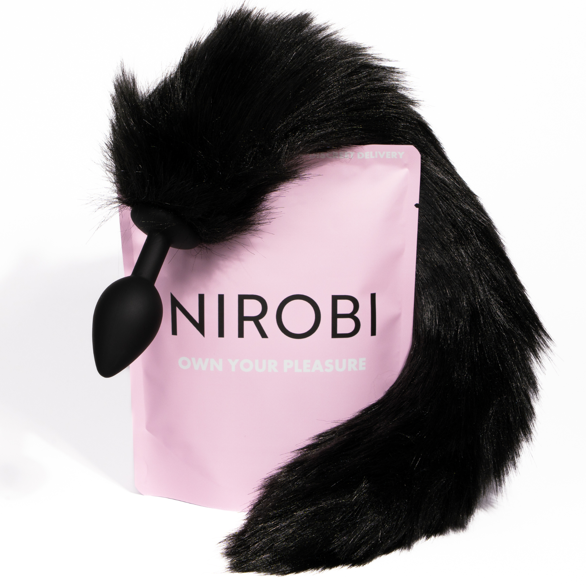 Black fox tail butt plug made from body-safe silicone with soft faux-fur tail for anal pleasure and play.